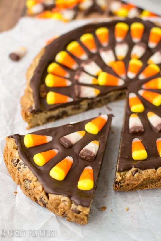 Harvest Chocolate Chip Cookie Cake with one triangle slice cut out but still showing in the photo