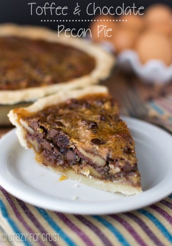 Toffee Chocolate Pecan Pie slice on white plate with title