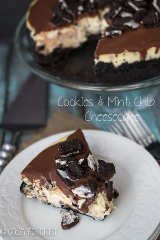 Cookies and Mint Chip Cheesecake on clear serving tray with one slice sitting below it on a white plate