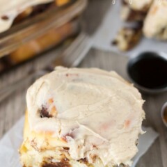 Gingerbread Spice Cinnamon Rolls on parchment paper with title