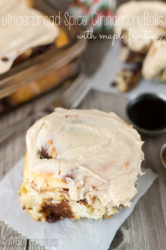 Gingerbread Spice Cinnamon Rolls on parchment paper with title