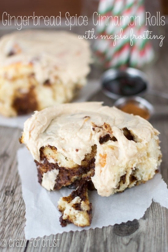 Gingerbread Spice Cinnamon Rolls on parchment paper with title