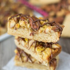 stack of maple nut bars on parchment paper