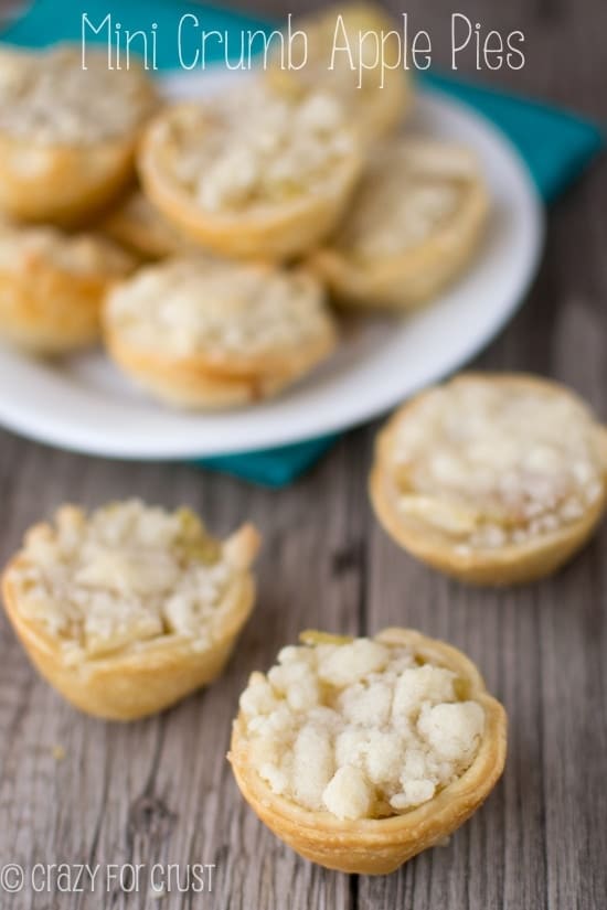 Mini Crumb Apple Pies on wooden board with title