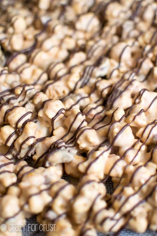 Peanut Butter Caramel Corn with chocolate drizzle on top