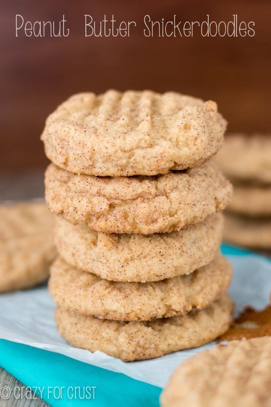 Stack of Peanut butter snickerdoodles on parchment paper