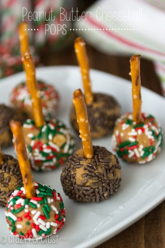 Peanut Butter Cheeseball Pops on a white plate with title