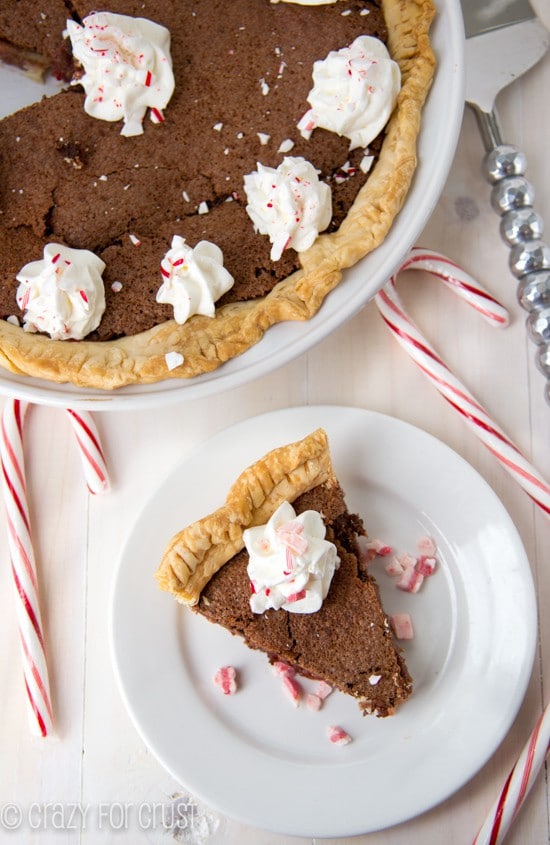 Peppermint chocolate chess pie overhead shot on white plate 