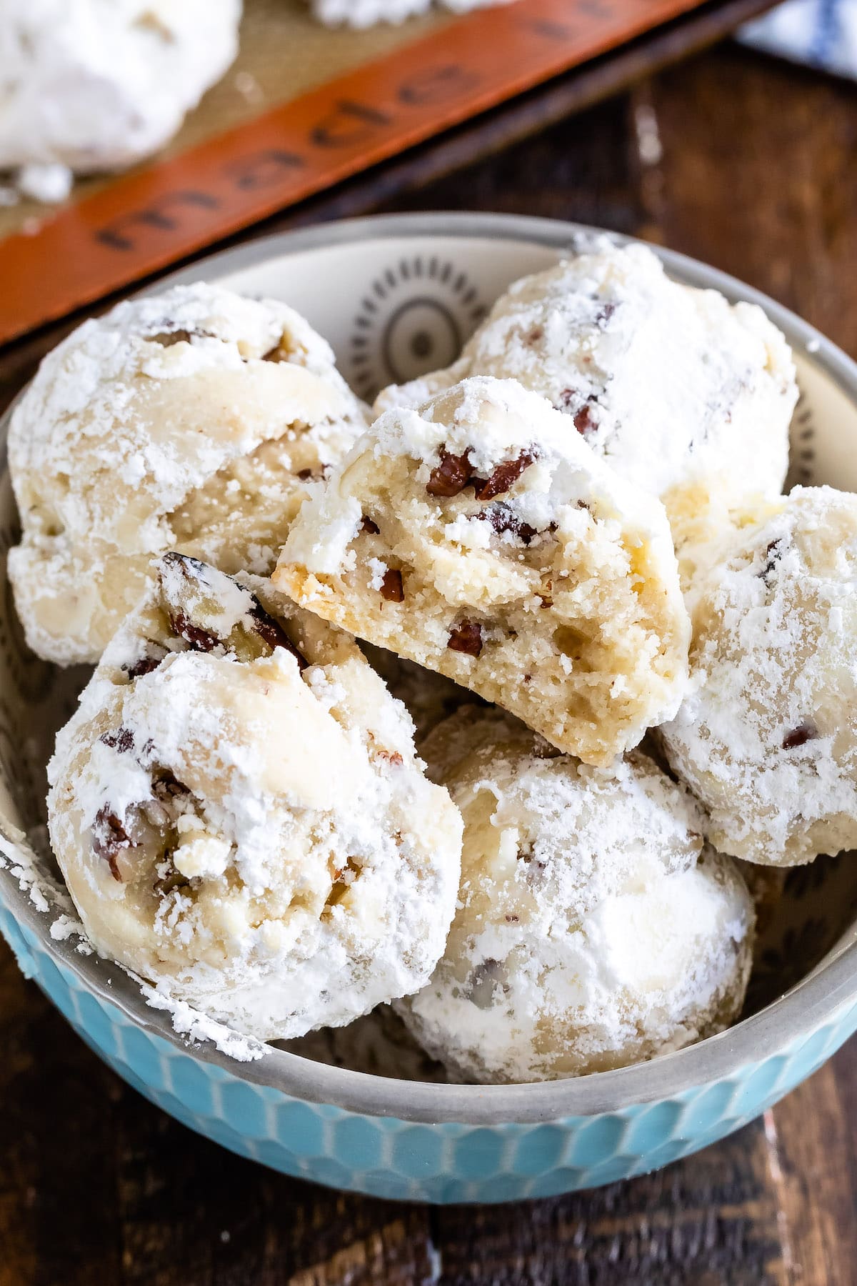 cookies in a bowl with one cut in half