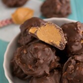 Peanut Butter Mountain Bars in a white bowl with title