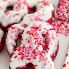 soft pretzel made with red velvet with frosting and sprinkles