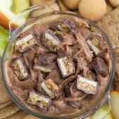 Overhead shot of snicker dip with apples and cookies and title
