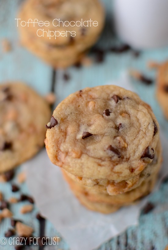 Overhead shot of Stack of toffee chocolate chippers on parchment paper with title