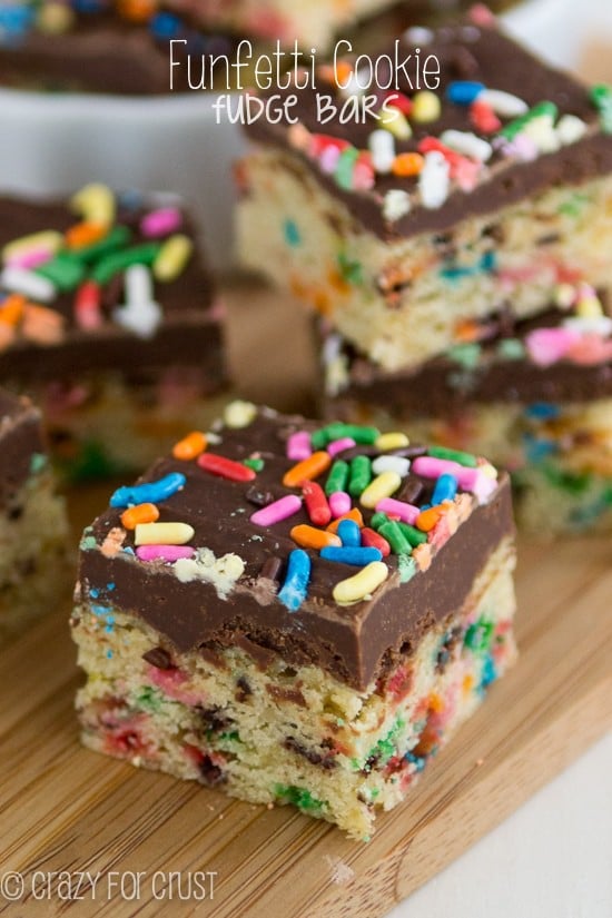 funfetti cookie bars with fudge topping and sprinkles