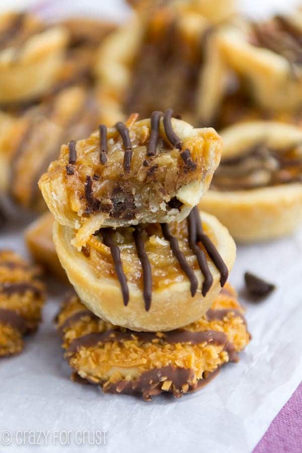 Mini Samoa Pies stacked with top one cut in half to show inside filling