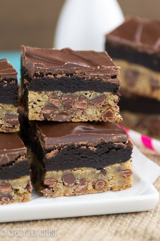 Oreo Truffle Chocolate Chip Cookie Bars stacked on a white plate