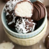 coconut cream truffles sliced in half in bowl