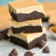 stack of peanut butter cookie dough bars on parchment