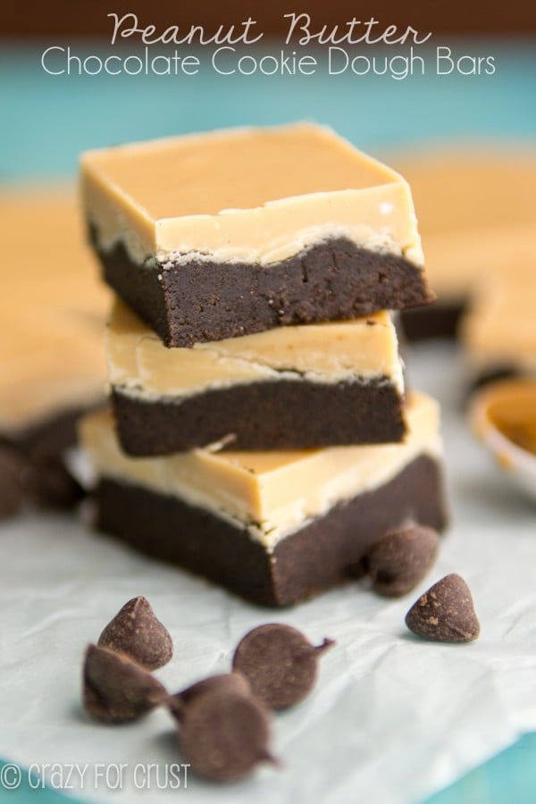 stack of peanut butter cookie dough bars on parchment