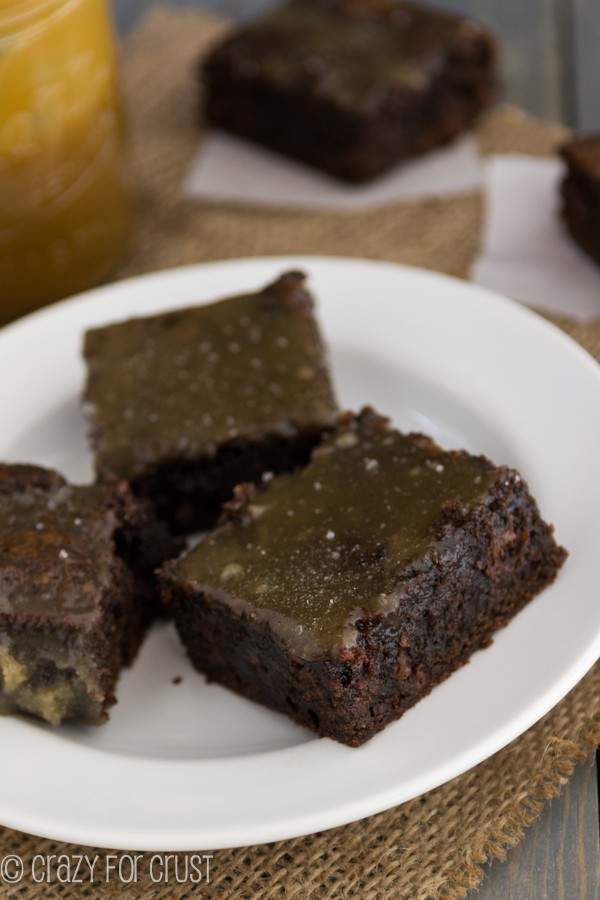 Homemade salted butterscotch gets poured onto hot fudgy brownies making for one incredible gooey dessert!