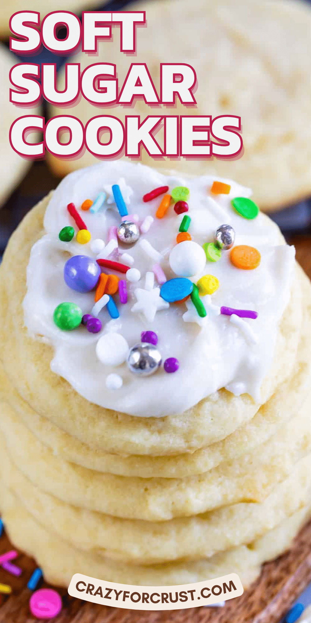 A stack of perfect sugar cookies topped with white frosting and colorful sprinkles, with the words Soft Sugar Cookies in bold letters above. A “crazyforcrust.com” label is at the bottom.
