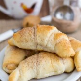 Peanut Butter Snickerdoodle Crescent Rolls sitting on a white plate
