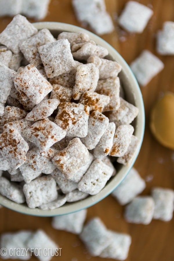 Peanut Butter Snickerdoodle Muddy Buddies sitting in a bowl, pictured from above 