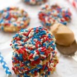 Peanut Butter Sprinkle Cookies stacked with red, white and blue sprinkles