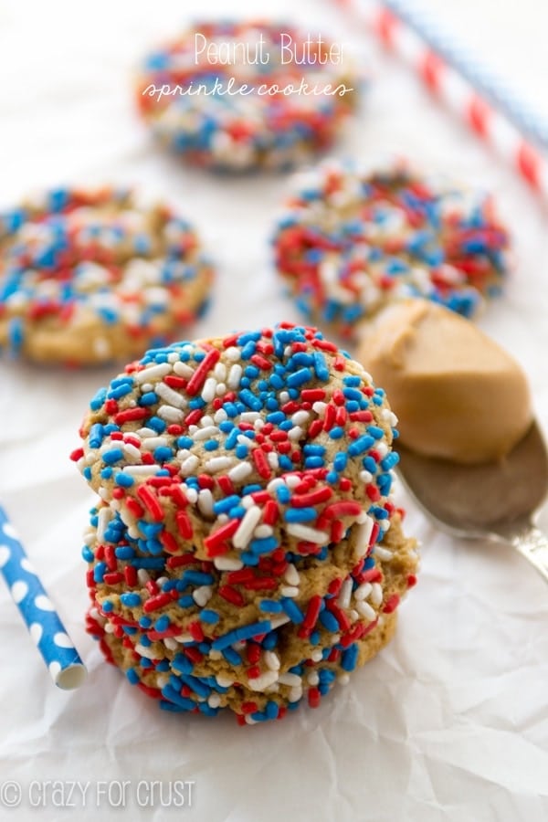 Peanut Butter Sprinkle Cookies stacked with red, white and blue sprinkles 