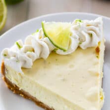 key lime cheesecake on white plate