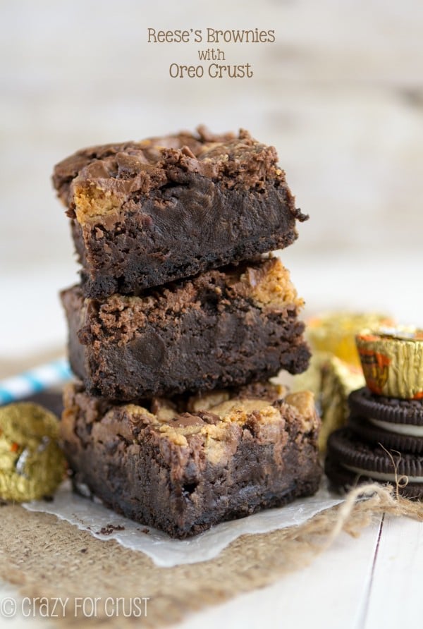 Oreo Peanut Butter Cup Brownies stacked on top of each other 