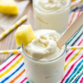 pineapple whip in glass with striped napkin