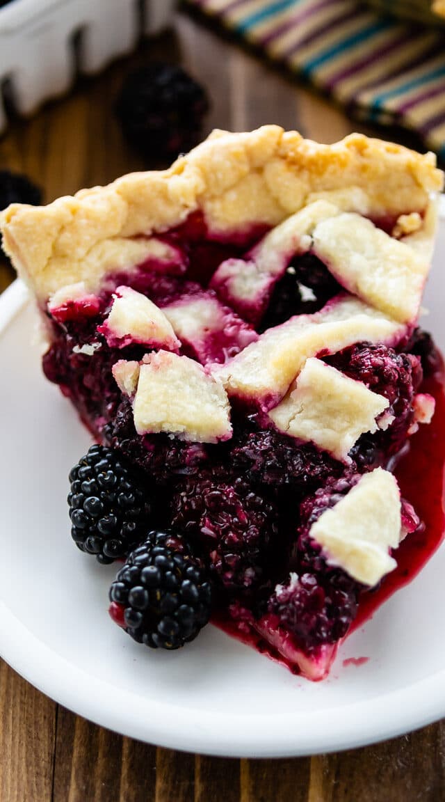 slice of blackberry pie on plate