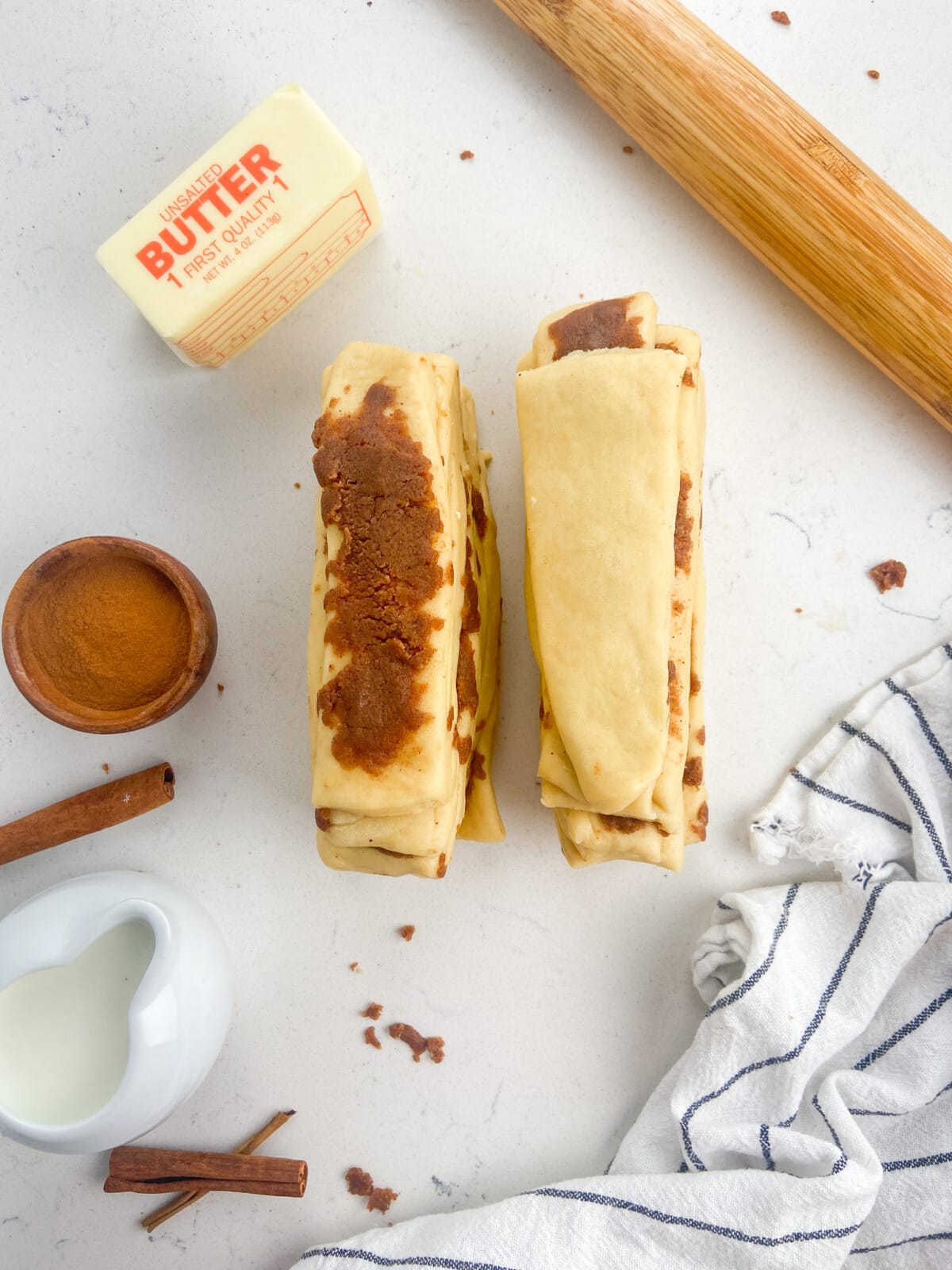 stacks of yeasted bread pieces layered with cinnamon sugar mixture.