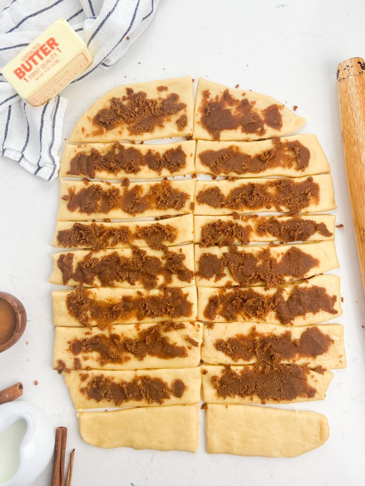 dough sliced with cinnamon mixture.