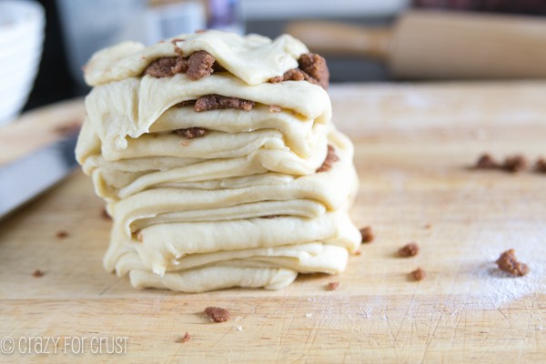 stack of cinnamon roll dough squares