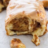 cinnamon roll bread with frosting cut open