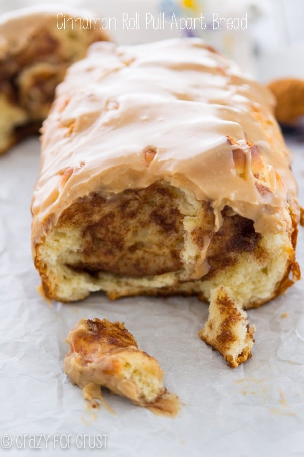 cinnamon roll bread with frosting cut open