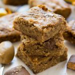 stack of butterfinger bars on white board