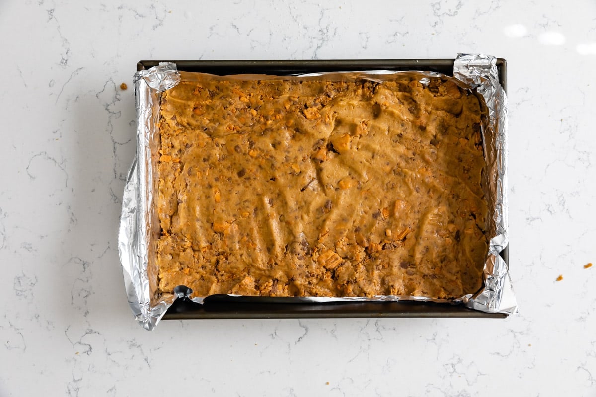 batter pressed in pan lined with foil