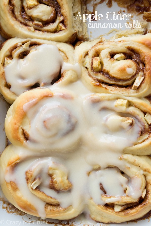 overhead shot of cinnamon rolls in pan with icing