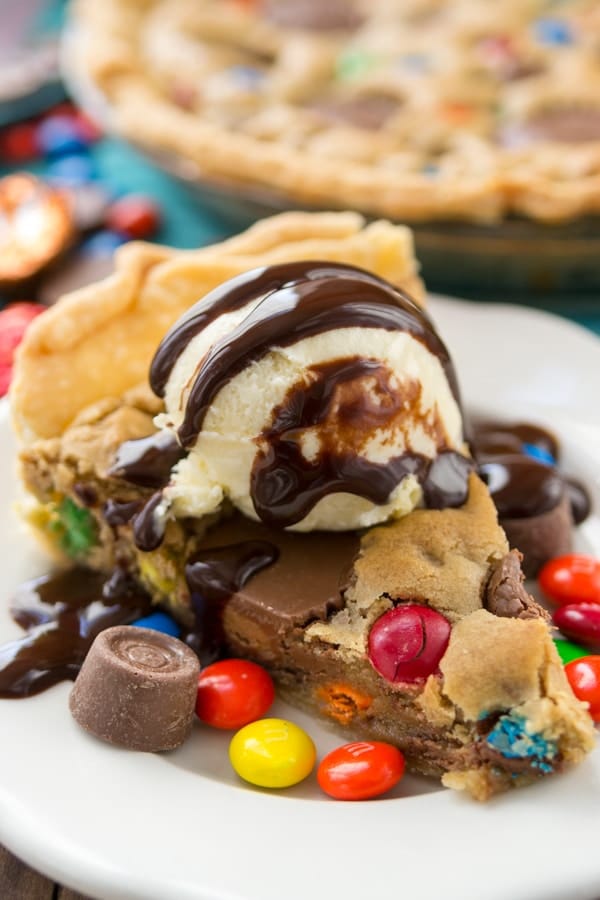 Candy Bar Pie filled with peanut butter cups and Rolos!