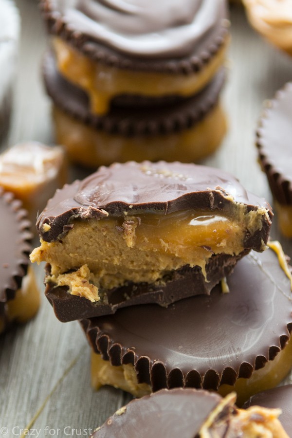 Caramel Peanut Butter Cups cut in half with gooey caramel