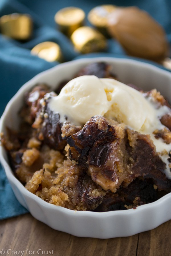 Slow Cooker Caramel Peanut Butter Hot Fudge Cake in a white bowl