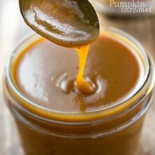 jar of caramel and spoon lifting some up