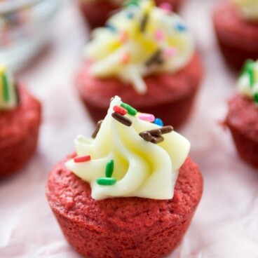 red velvet brownie bites with cream cheese frosting and sprinkles