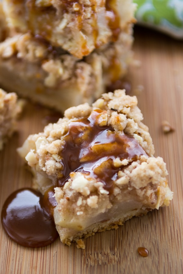 stack of pear pie bars with caramel on top