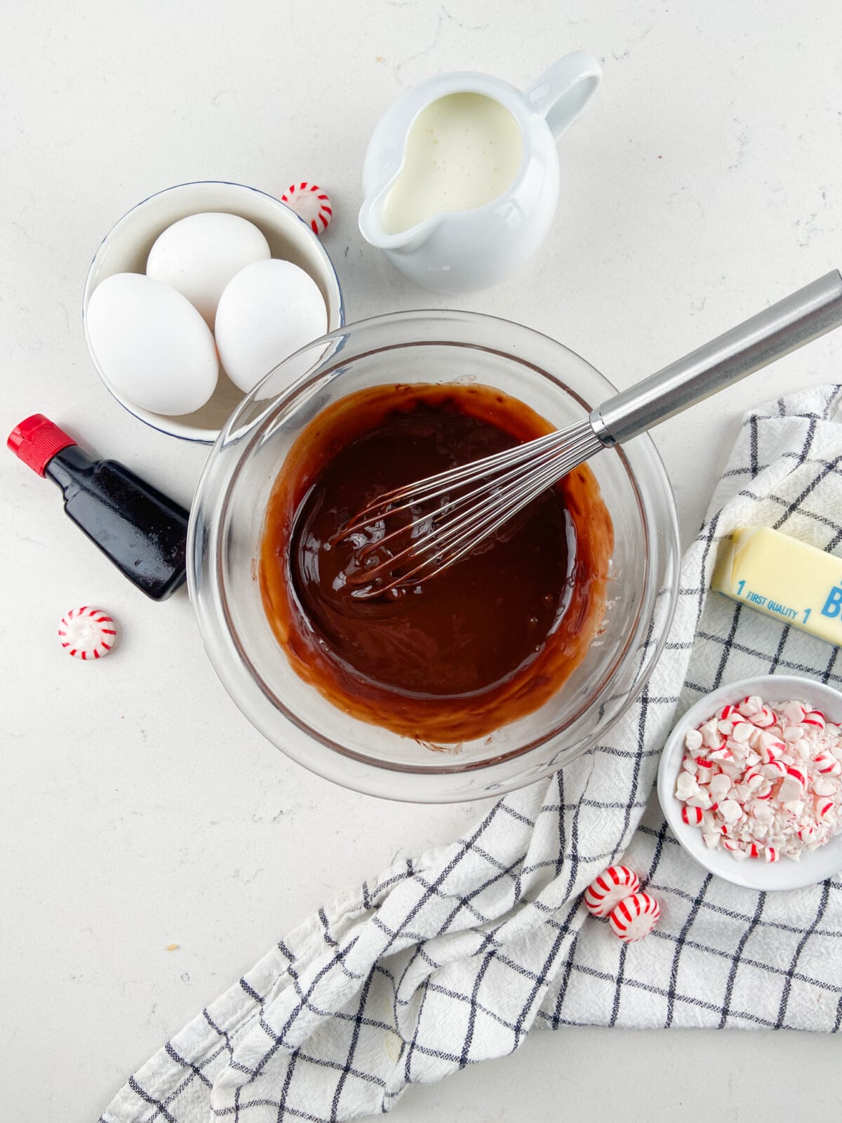 bowl of ganache with whisk.