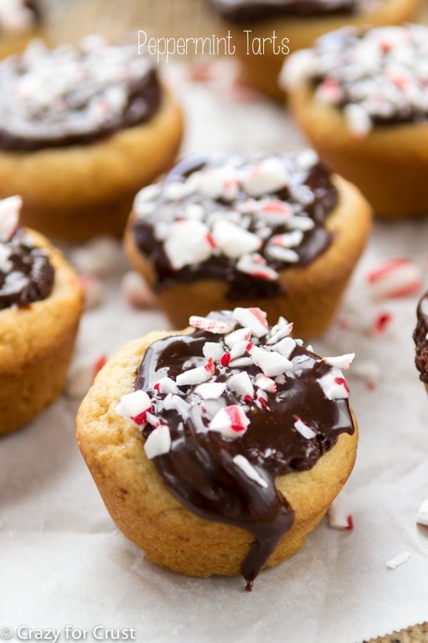 Peppermint Tarts - a sugar cookie tassie base filled with chocolate peppermint filling and topped with ganache!