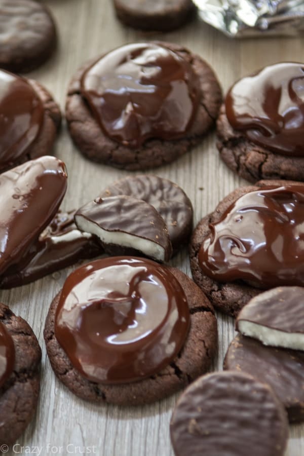 Double Chocolate Peppermint Patty Cookies are the ultimate chocolate cookie recipe! The soft cookie is topped with a York Peppermint Patty and chocolate ganache!